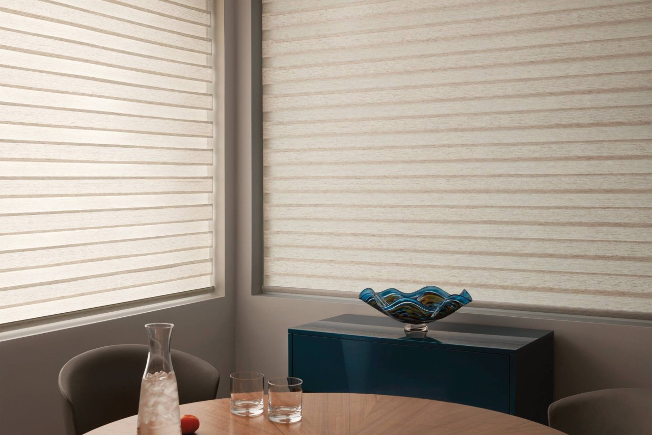 Hunter Douglas Designer Banded Shades in the windows of a small sitting room near La Quinta, CA